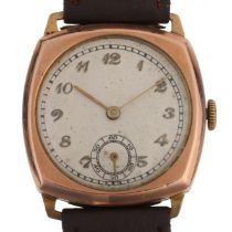 A mid-20th century 9ct rose gold cushion-cased mechanical wristwatch, silvered dial with applied