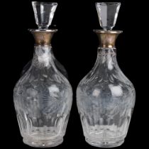 A pair of Elizabeth II silver-mounted glass wine decanters and stoppers, CJ Vander Ltd, London 1965,