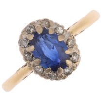 An 18ct gold sapphire and diamond oval cluster ring, platinum-topped with oval mixed-cut sapphire