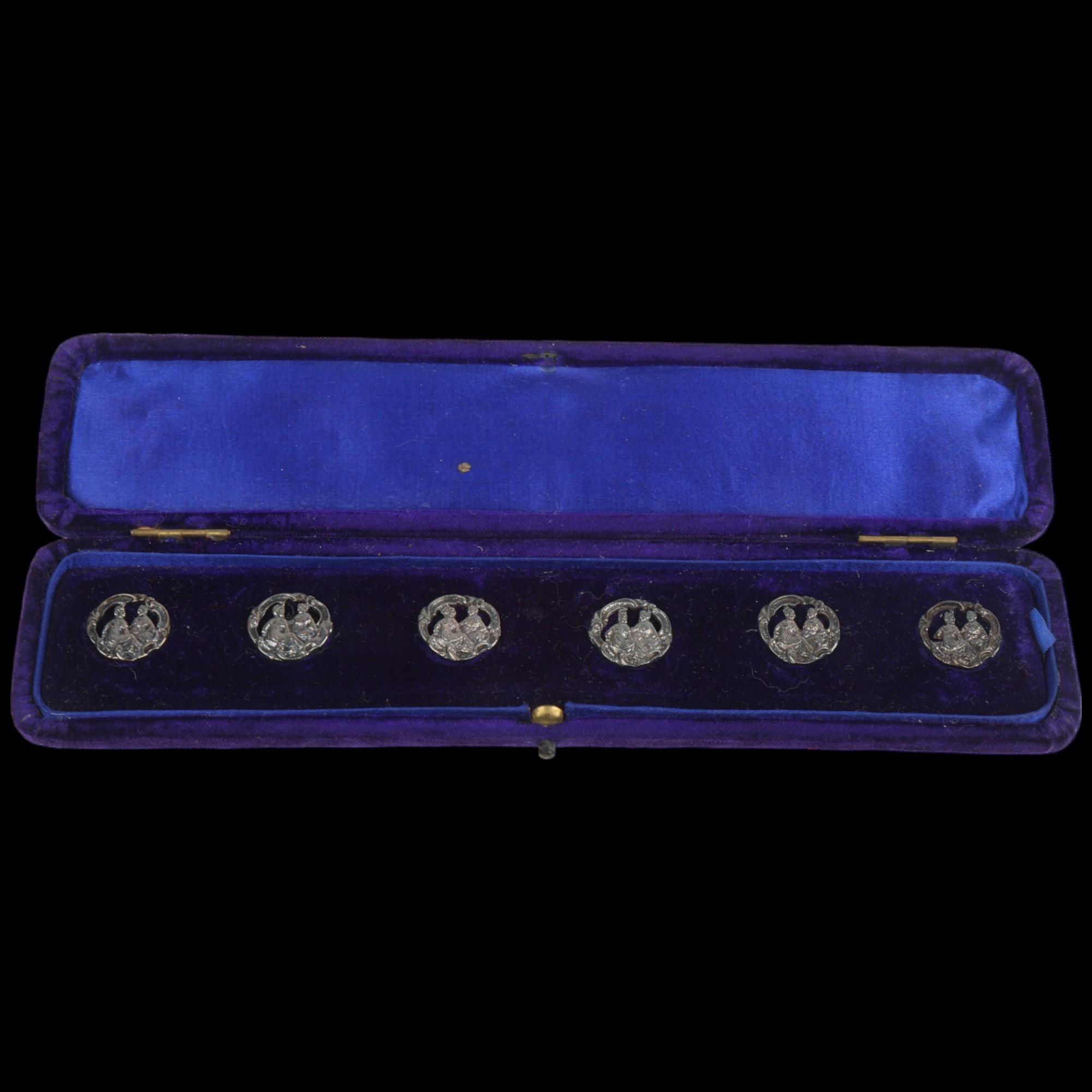 A cased set of 6 Art Nouveau buttons, registration no. 352928, apparently unmarked, 2cm No damage or