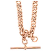 An Antique 9ct gold graduated hollow curb link Albert chain necklace, with 9ct T-bar dog clip and