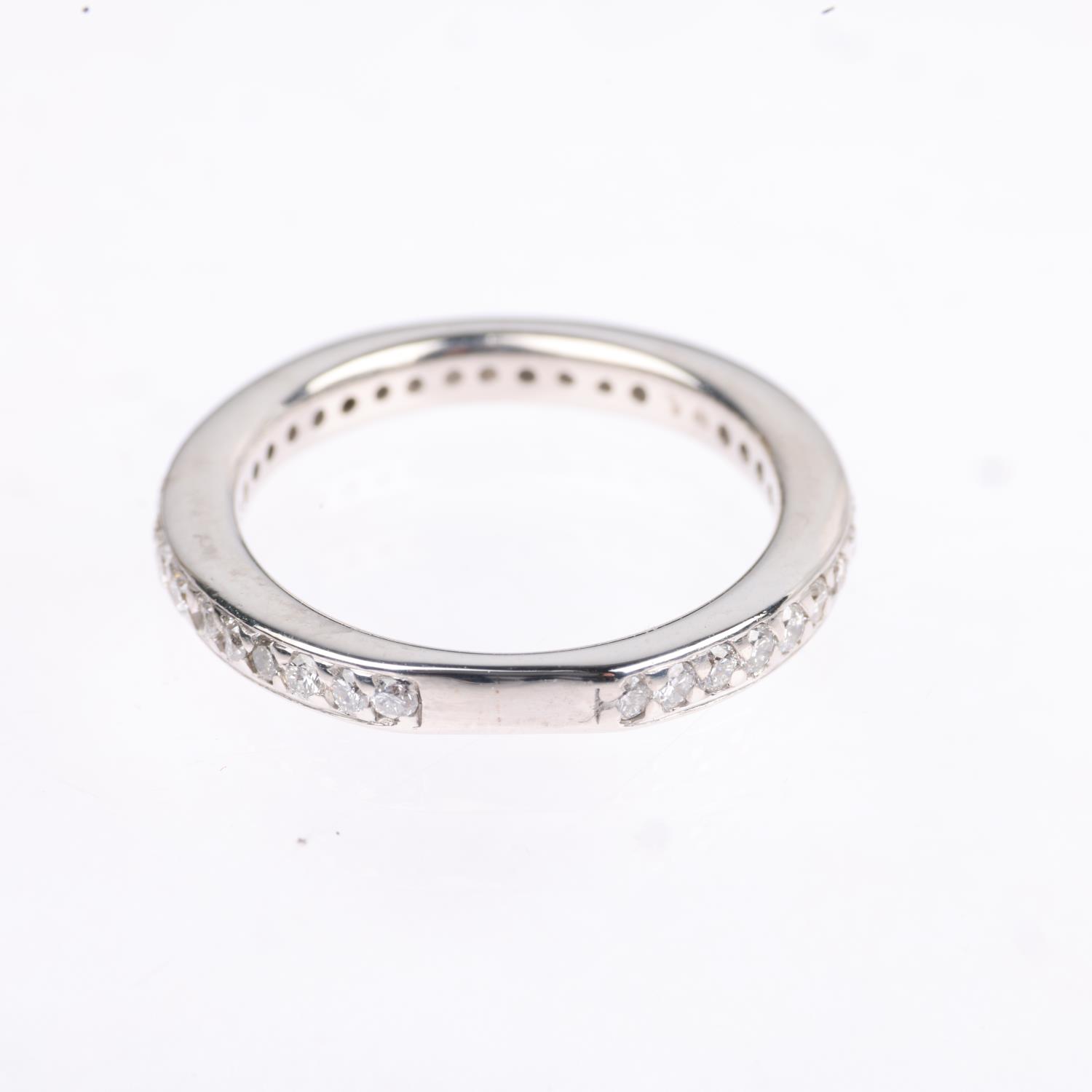 A diamond eternity ring, set with modern round brilliant-cut diamonds, total diamond content - Image 3 of 4