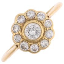 An 18ct gold diamond flowerhead cluster ring, rub-over set with modern round brilliant-cut diamonds,