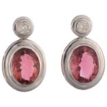 A pair of 18ct white gold pink tourmaline and diamond earrings, maker M&A, London 2018, rub-over set