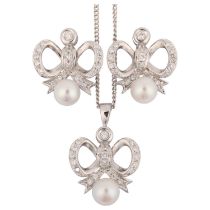 A modern whole pearl and diamond ribbon bow matching pendant necklace and earring set, set with
