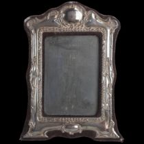 An Elizabeth II silver-fronted photo frame, maker JB Ltd, London 1986, internal measurements: 12.5cm