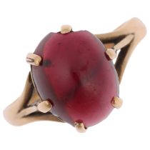 A 9ct gold garnet dress ring, claw set with oval cabochon garnet, setting height 10.8mm, size N, 3.