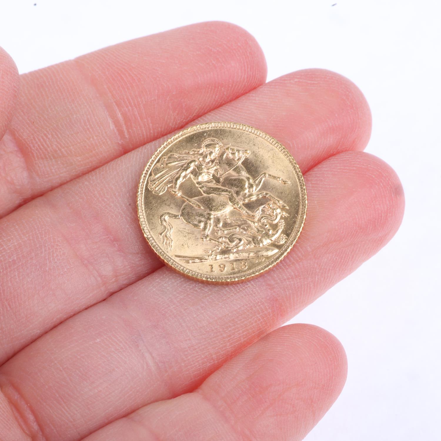 A George V 1913 gold full sovereign coin, 7.9g Light wear to high points - Image 4 of 4