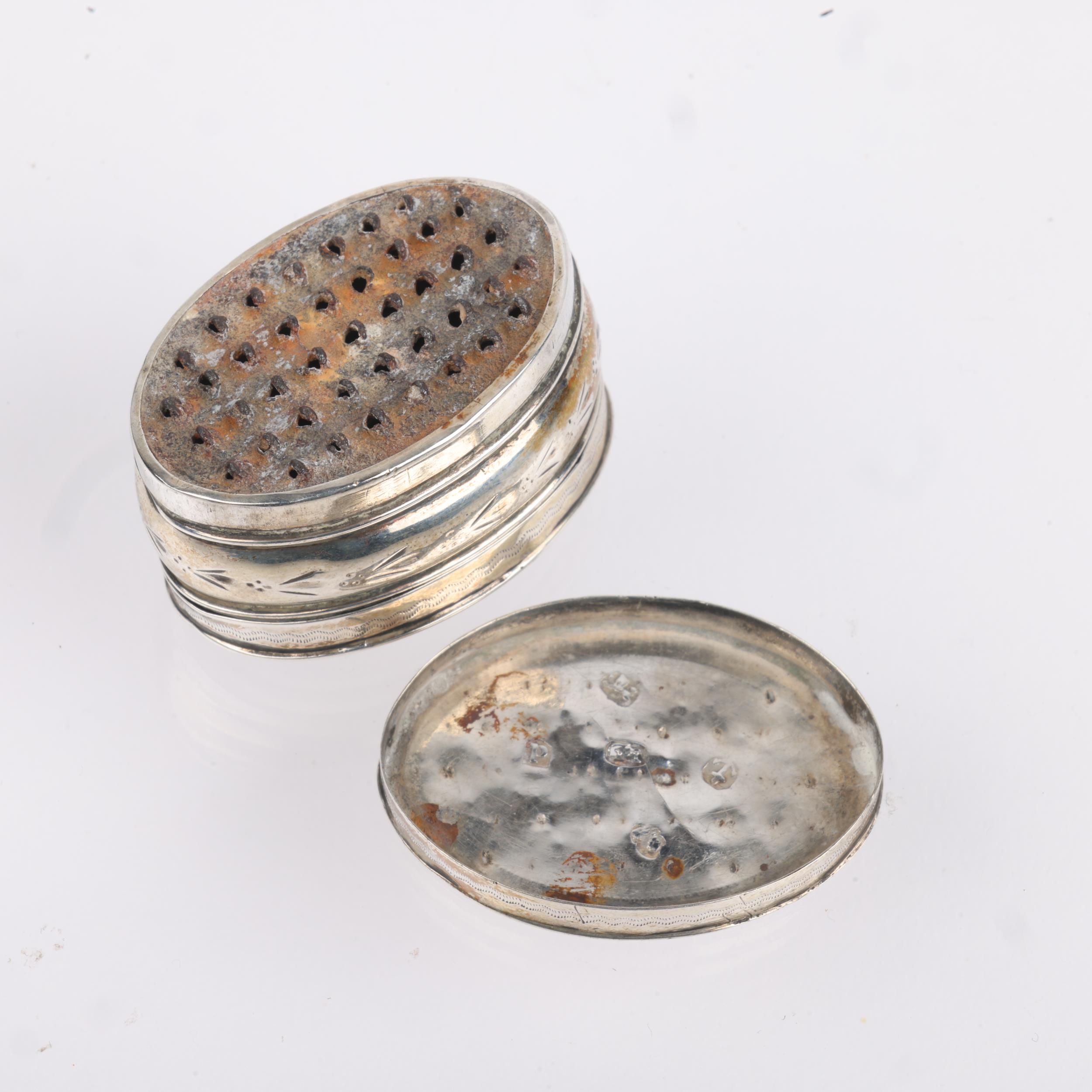 A George III silver nutmeg grater, maker IT, Birmingham 1801, oval bulbous form, with bright-cut - Image 3 of 3