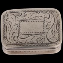 A William IV silver vinaigrette, Nathaniel Mills, Birmingham 1833, rectangular cushion form, with
