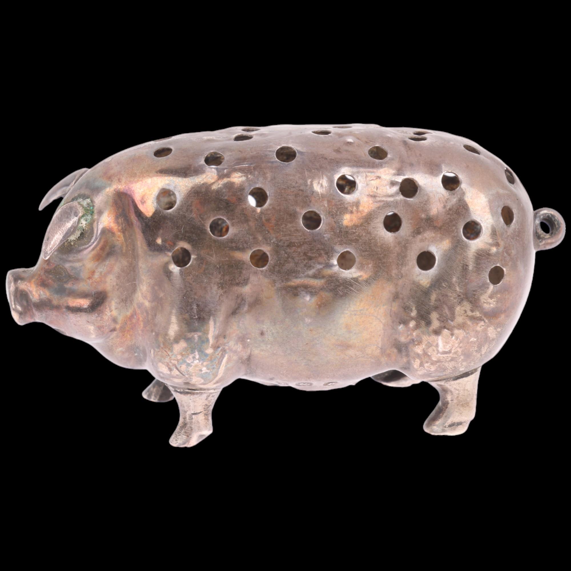 An Edwardian novelty silver figural pig pin cushion, Levi & Salaman, Birmingham 1905, 5.5cm