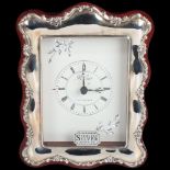 An Elizabeth II silver-fronted quartz mantel clock, R Carr, Sheffield 1991, 14.5cm x 11cm, boxed New