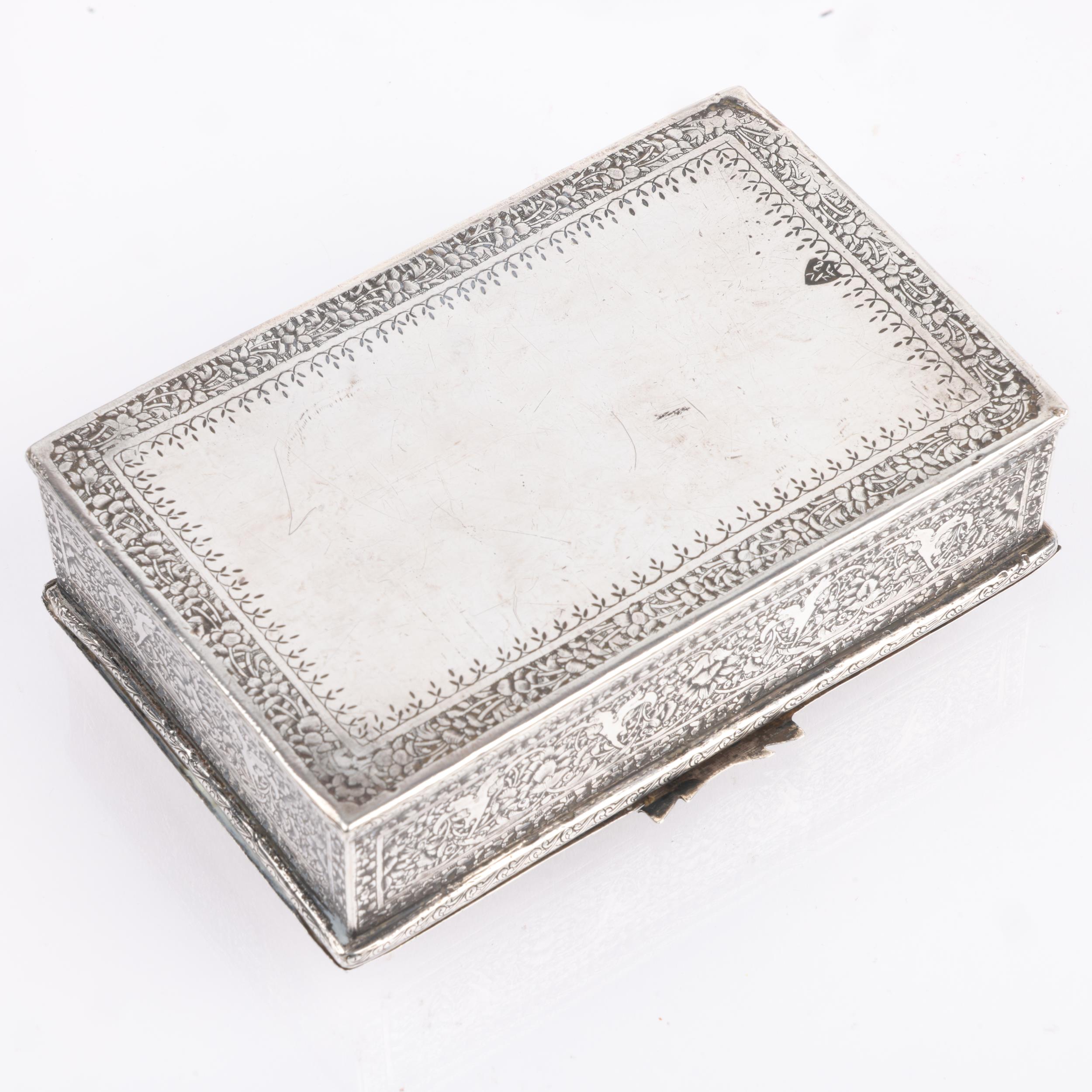 A Persian silver 'Musicians' cigarette box, allover engraved decoration, marked on base, 12.5cm x - Image 2 of 3
