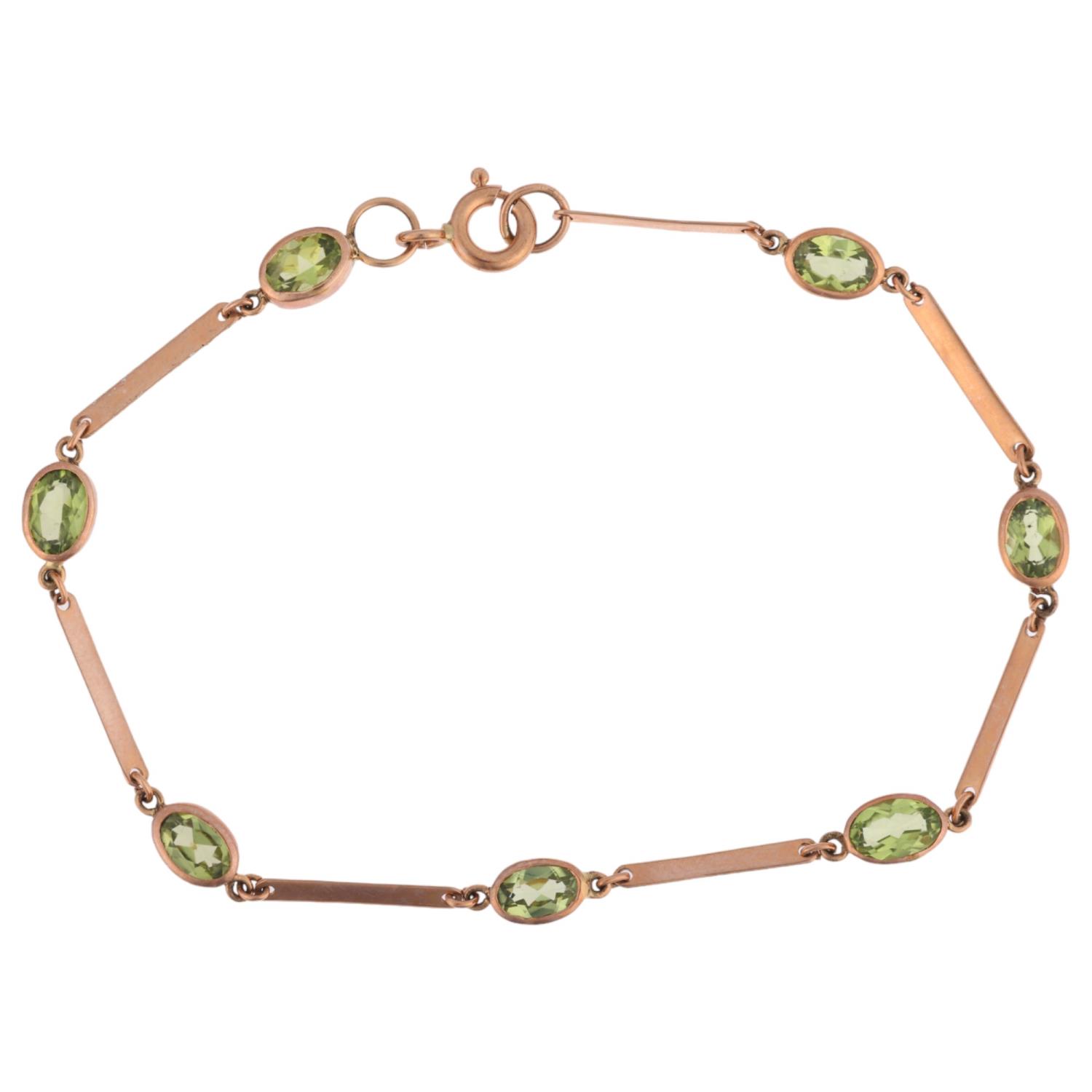 A 9ct rose gold peridot tennis line bracelet, maker SA, London 2011, rub-over set with oval mixed-