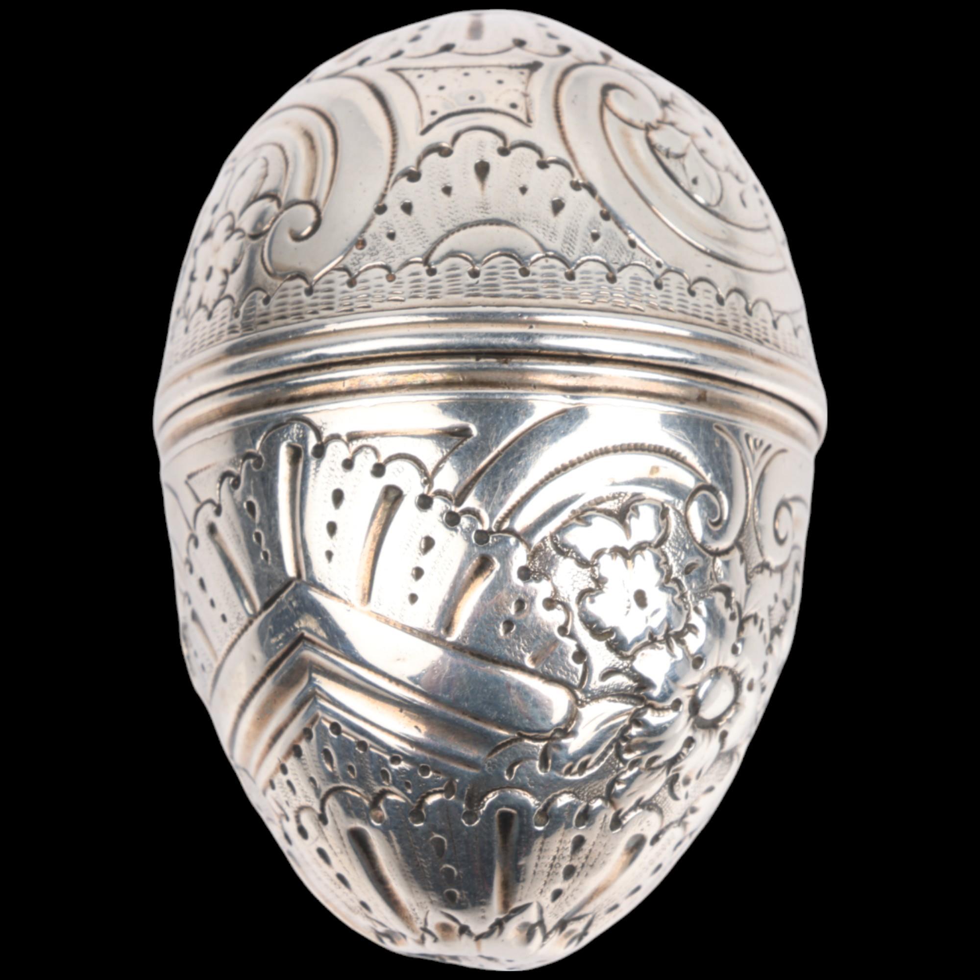 A George III silver egg nutmeg grater, maker SM, probably Samuel Meriton II, circa 1780, allover