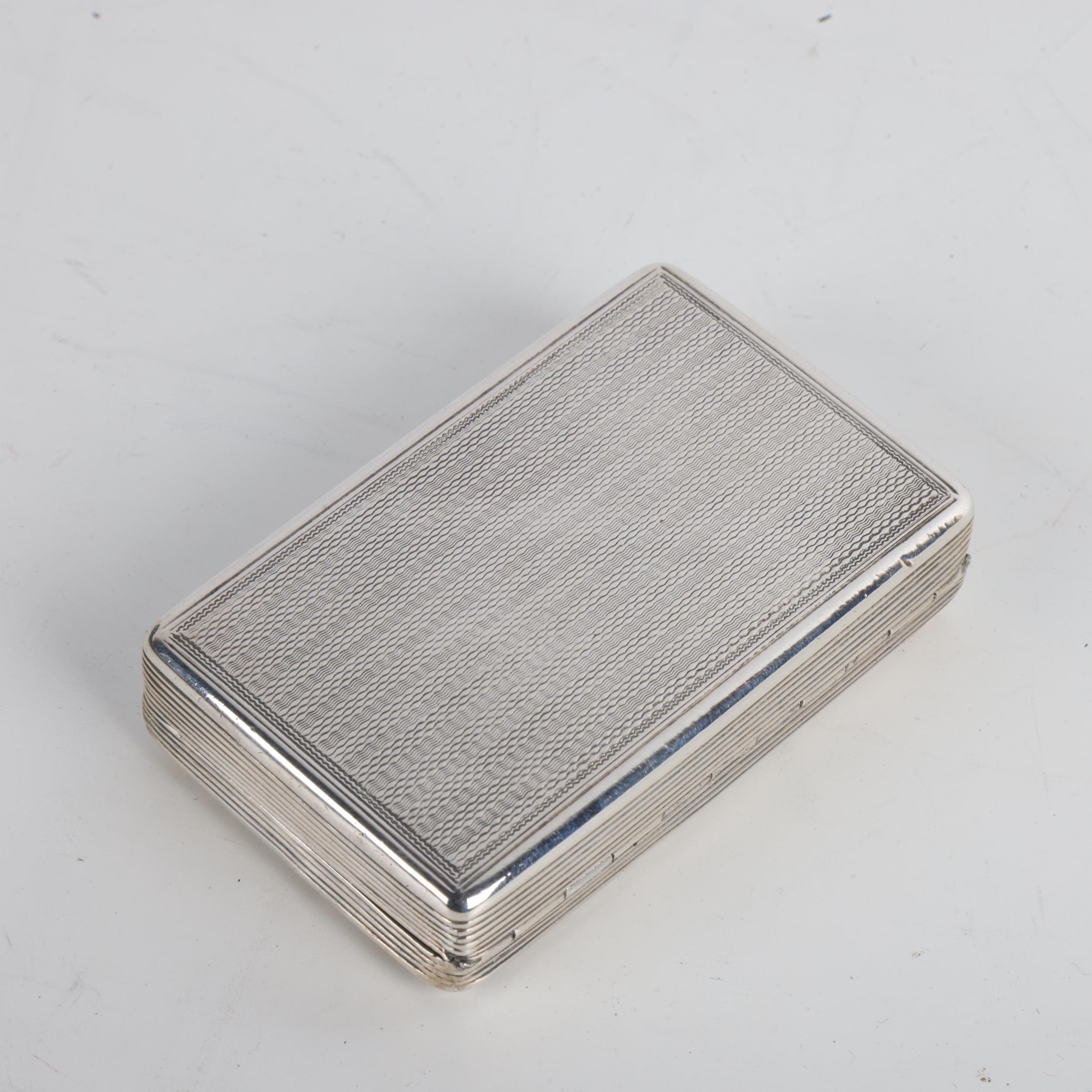 A William IV silver snuffbox, Thomas Edwards, London 1831, rectangular form, with engine turned - Image 3 of 3