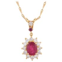 A French 18ct gold ruby and diamond flowerhead cluster pendant necklace, on 18ct fancy link chain,