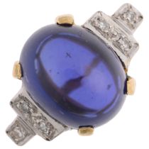 An 18ct gold iolite and diamond dress ring, maker S&R, London 1976, claw set with oval cabochon