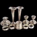 Various silver, including pair of trumpet bud vases, candlesticks, napkin rings, etc Lot sold as