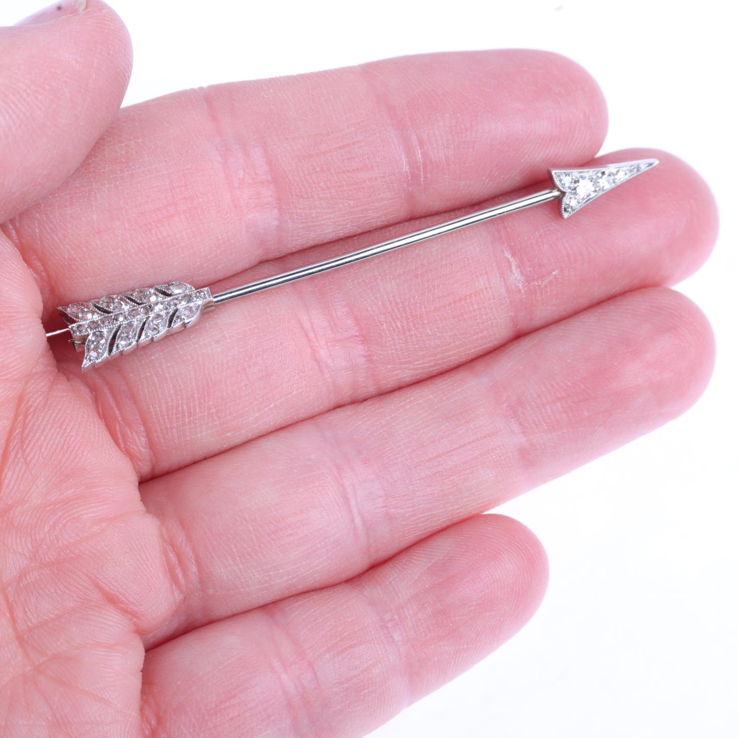 An Art Deco diamond 'Arrow' jabot pin, circa 1920, set with round and old-cut diamonds, unsigned and - Image 4 of 4