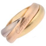 CARTIER - an 18ct three-colour gold Trinity ring, circa 2020, modelled as 3 entwined band rings,