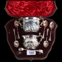 A cased late Victorian silver tea drinking set, Goldsmiths & Silversmiths Co Ltd, London 1893,