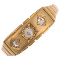 An early 20th century 18ct gold three stone diamond half hoop ring, set with round brilliant and