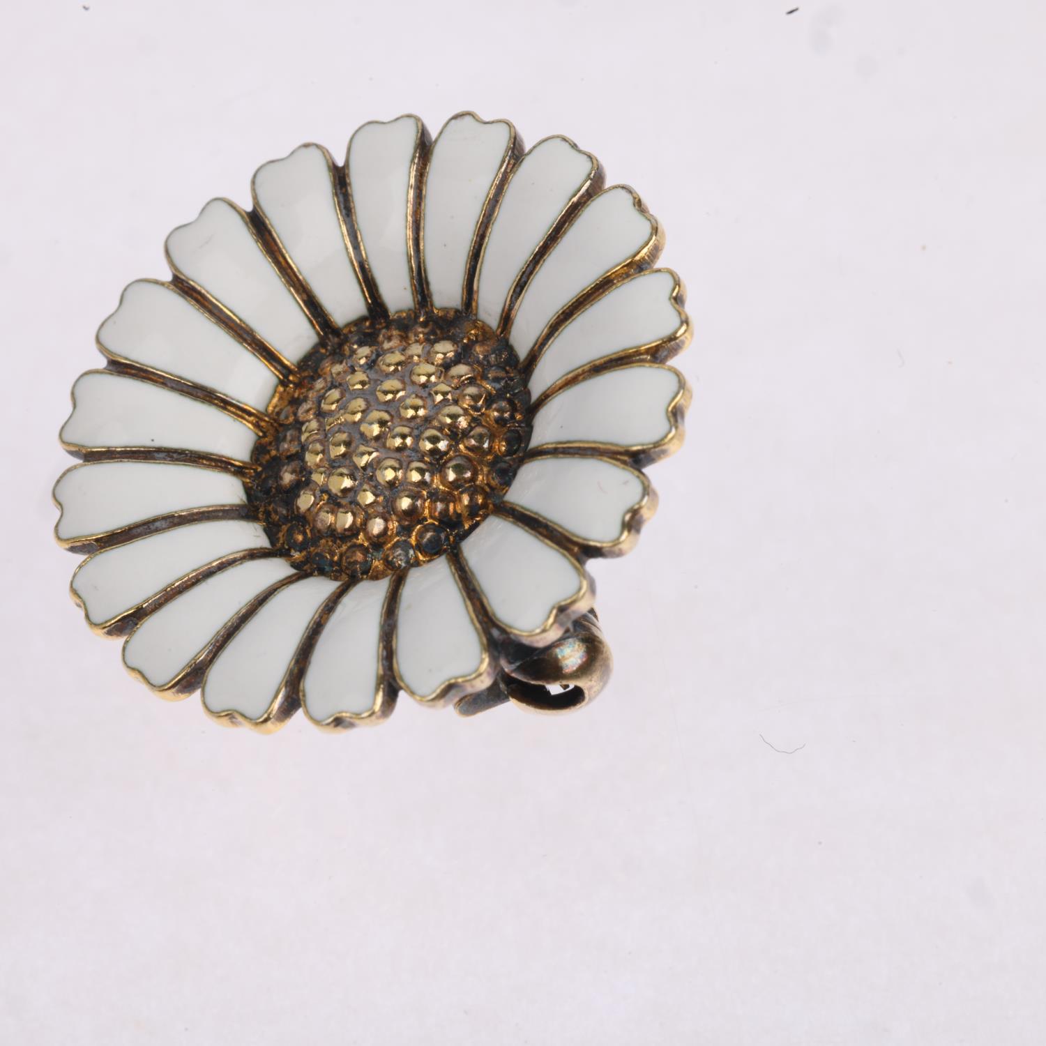 BERNHARD HERTZ - a a Danish modernist sterling silver-gilt white enamel daisy pattern brooch, 29. - Image 2 of 3