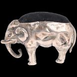 An Edwardian novelty silver figural elephant pin cushion, Adie & Lovekin Ltd, Birmingham 1906, 4cm 1