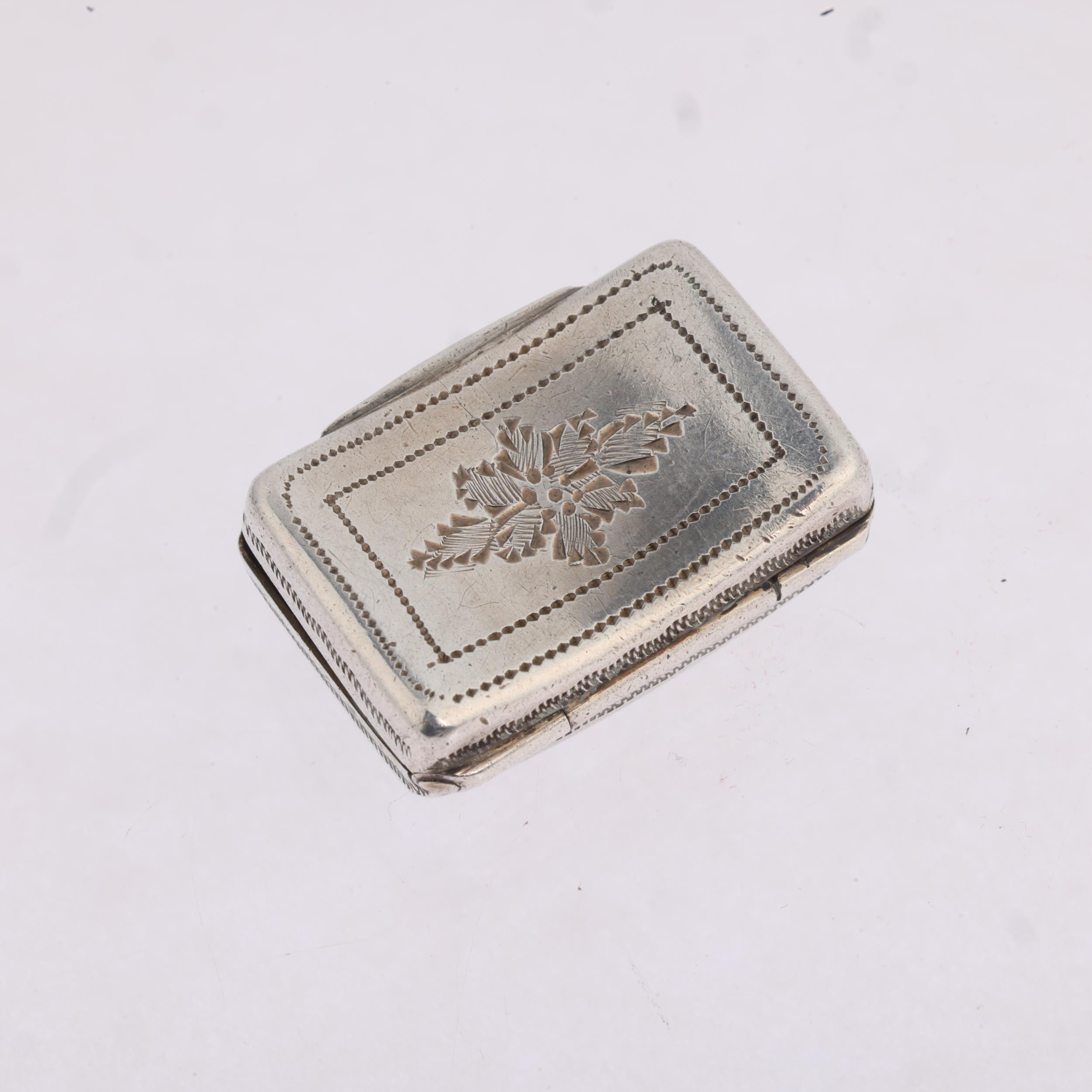 A George IV silver vinaigrette, maker TS, Birmingham 1822, curved rectangular form, with bright- - Image 2 of 3