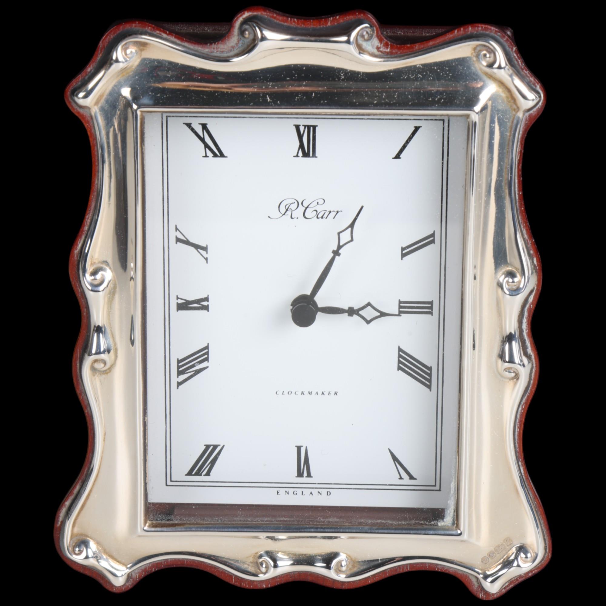 An Elizabeth II silver-fronted quartz mantel clock, R Carr, Sheffield 1989, 12.5cm x 9.5cm, boxed