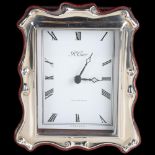 An Elizabeth II silver-fronted quartz mantel clock, R Carr, Sheffield 1989, 12.5cm x 9.5cm, boxed