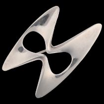 GEORG JENSEN - a large a Danish modernist sterling silver abstract brooch, designed by Henning