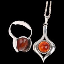 A a Danish modernist sterling silver amber openwork pendant necklace and ring, makers include