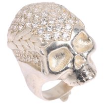 VIVIENNE WESTWOOD - a sterling silver and cubic zirconia skull ring, setting height 35.2mm, size