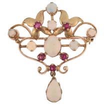 A late 20th century 9ct gold ruby and opal openwork pendant/brooch, maker PSR, London 1976, in the