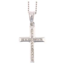 A modern 9ct white gold diamond cross pendant necklace, on 9ct fine curb link chain, total diamond