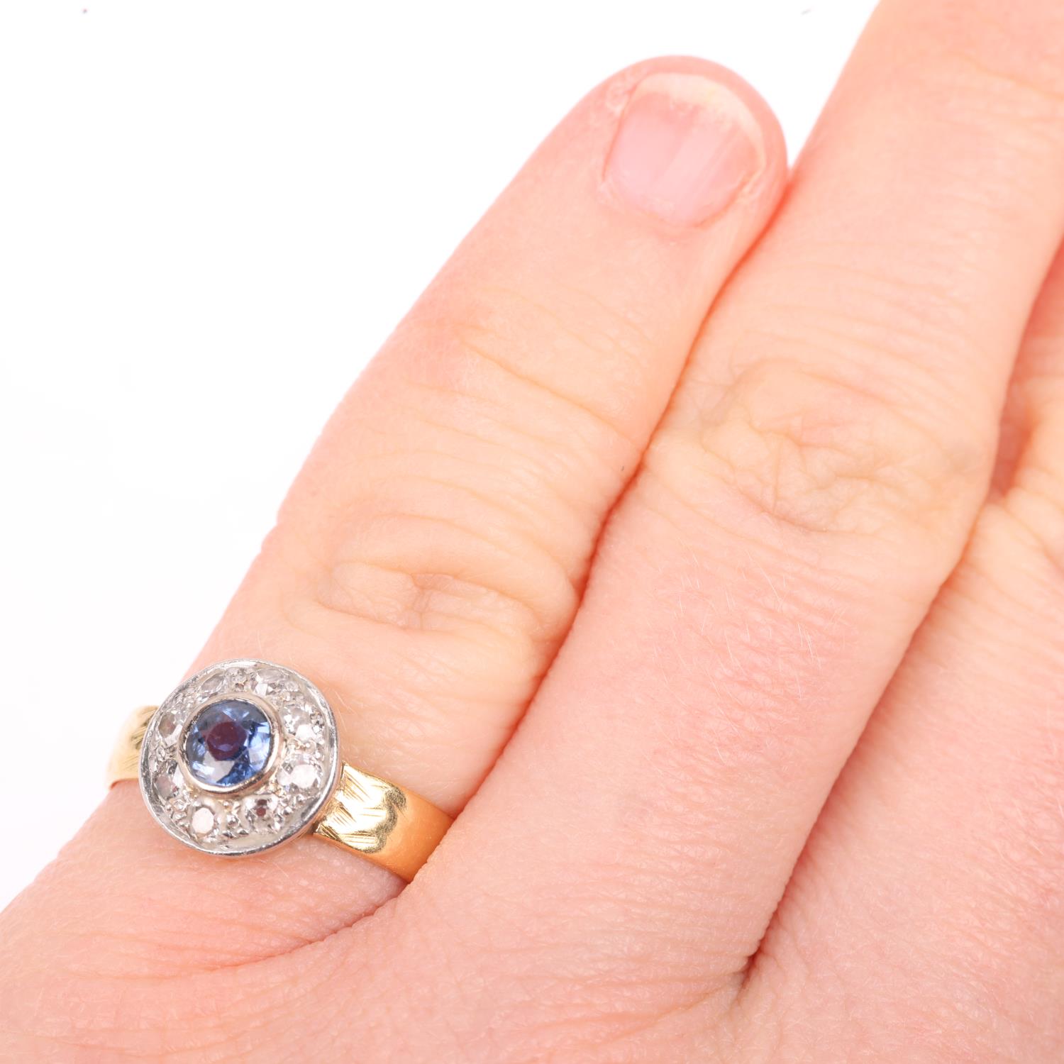 An 18ct gold sapphire and diamond target cluster ring, maker CG&S, Birmingham 1967, set with round- - Image 4 of 4