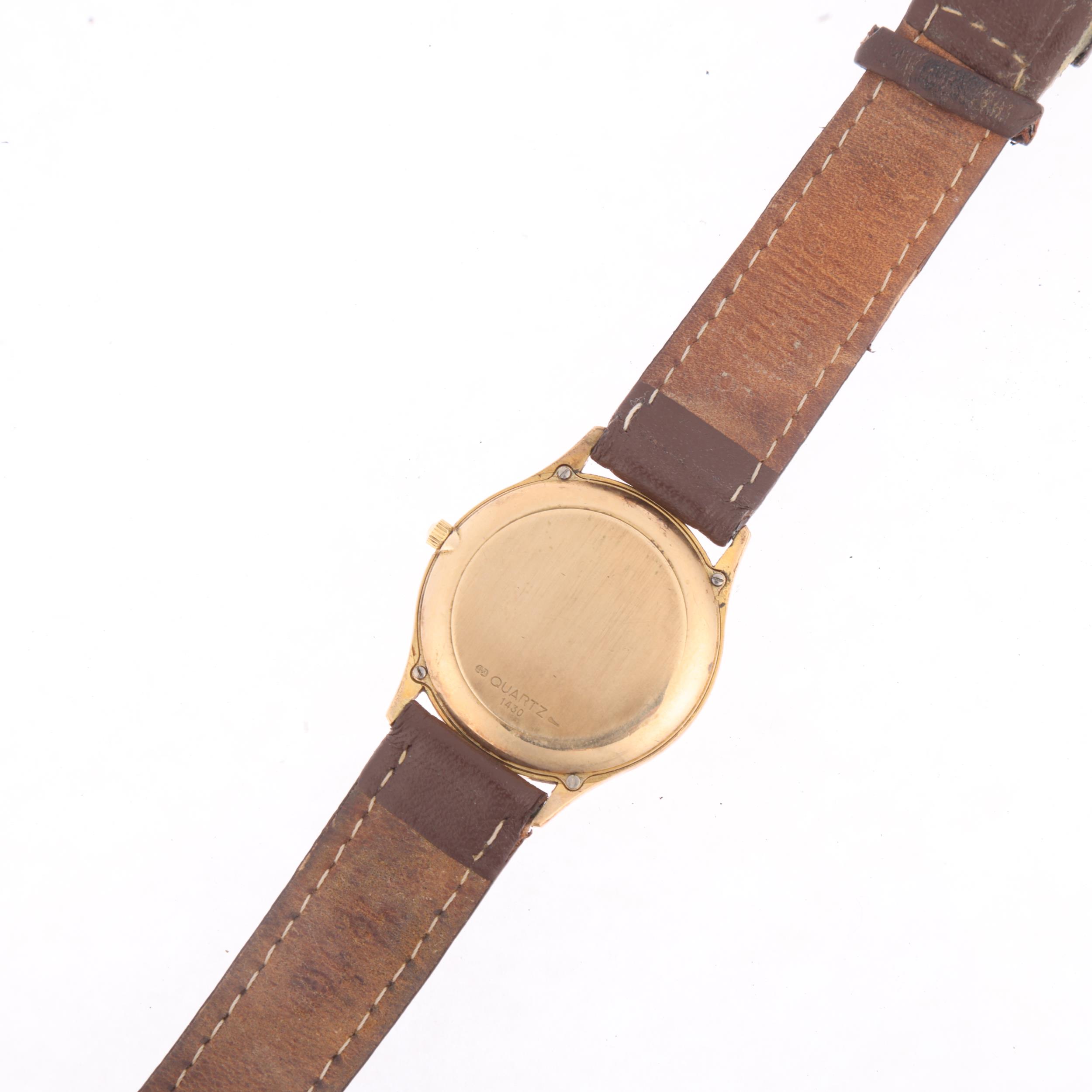 OMEGA - a 9ct gold Seamaster quartz calendar wristwatch, ref. 1430, circa 1982, champagne dial - Image 3 of 5