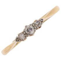 An 18ct gold three stone diamond ring, platinum-topped, set with round-cut diamonds, total diamond