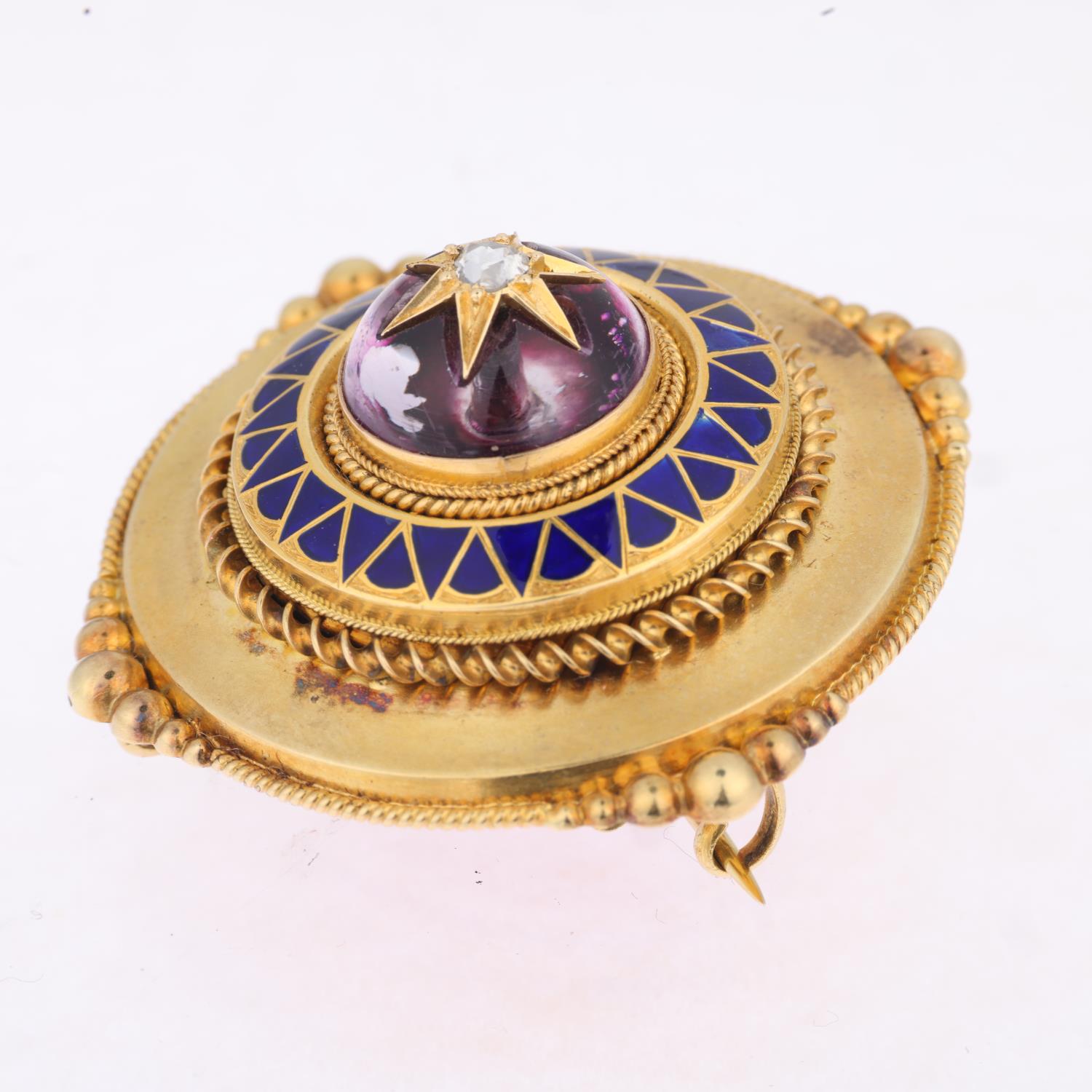 A Victorian Etruscan Revival diamond amethyst and blue enamel bombe memorial brooch, circa 1880, - Image 2 of 4