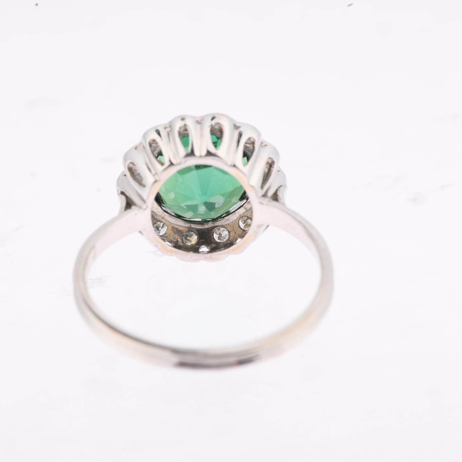 An 18ct white gold green tourmaline and diamond flowerhead cluster ring, centrally claw set with 3ct - Image 3 of 4