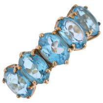 A 9ct gold five stone blue topaz half hoop ring, setting height 8mm, size M, 3.4g No damage or