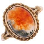 A 1970s 9ct gold moss agate dress ring, maker S&Co, Birmingham 1972, set with oval cabochon agate,