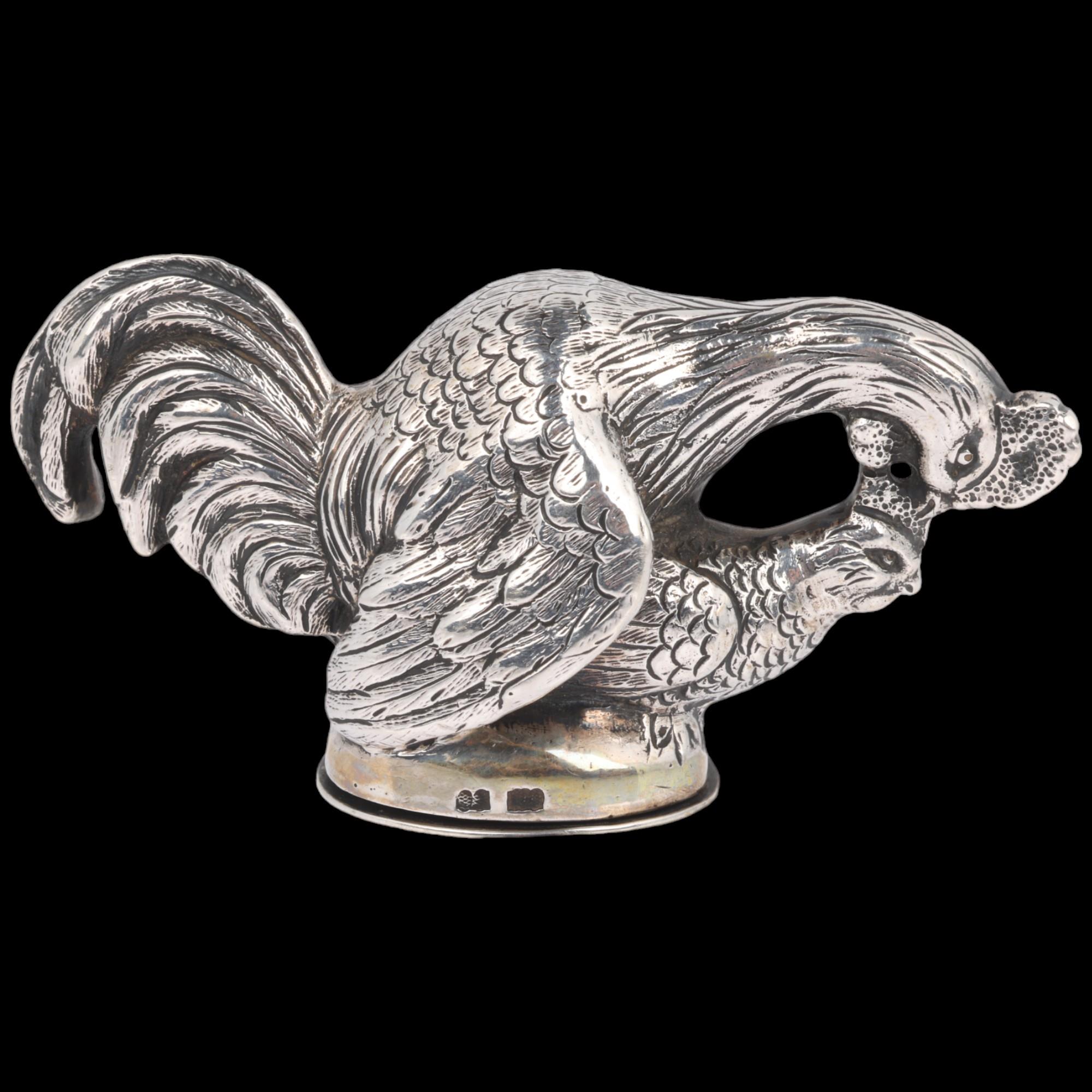 A German silver novelty figural box, Georg Roth & Co, Hanau, circa 1900, cockerel and hen, 8cm, 2.