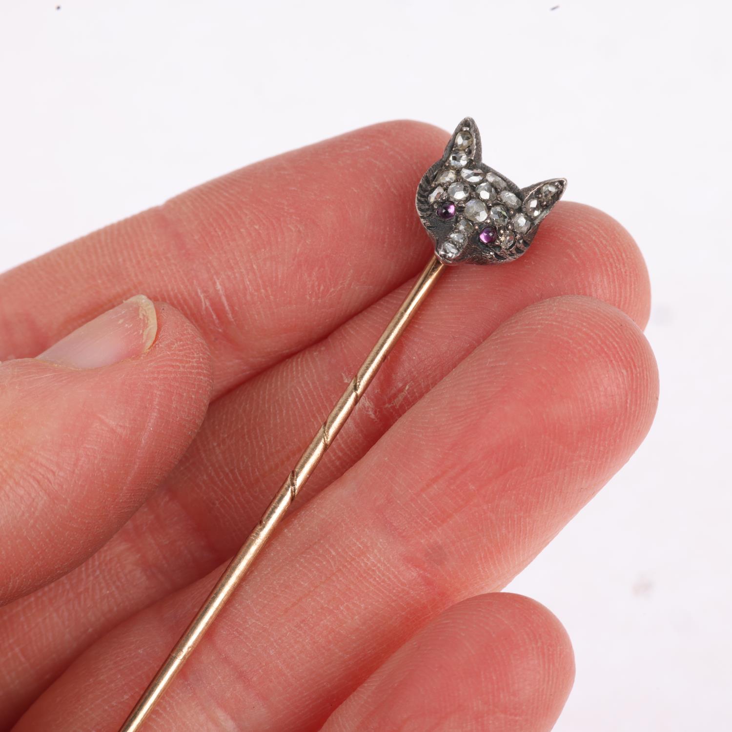 An Antique ruby and diamond fox-head stickpin, circa 1900, pave set with round cabochon ruby eyes - Image 4 of 4