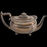 **WITHDRAWN** - A George III silver teapot, Charles Fox, London 1815, oval bulbous form