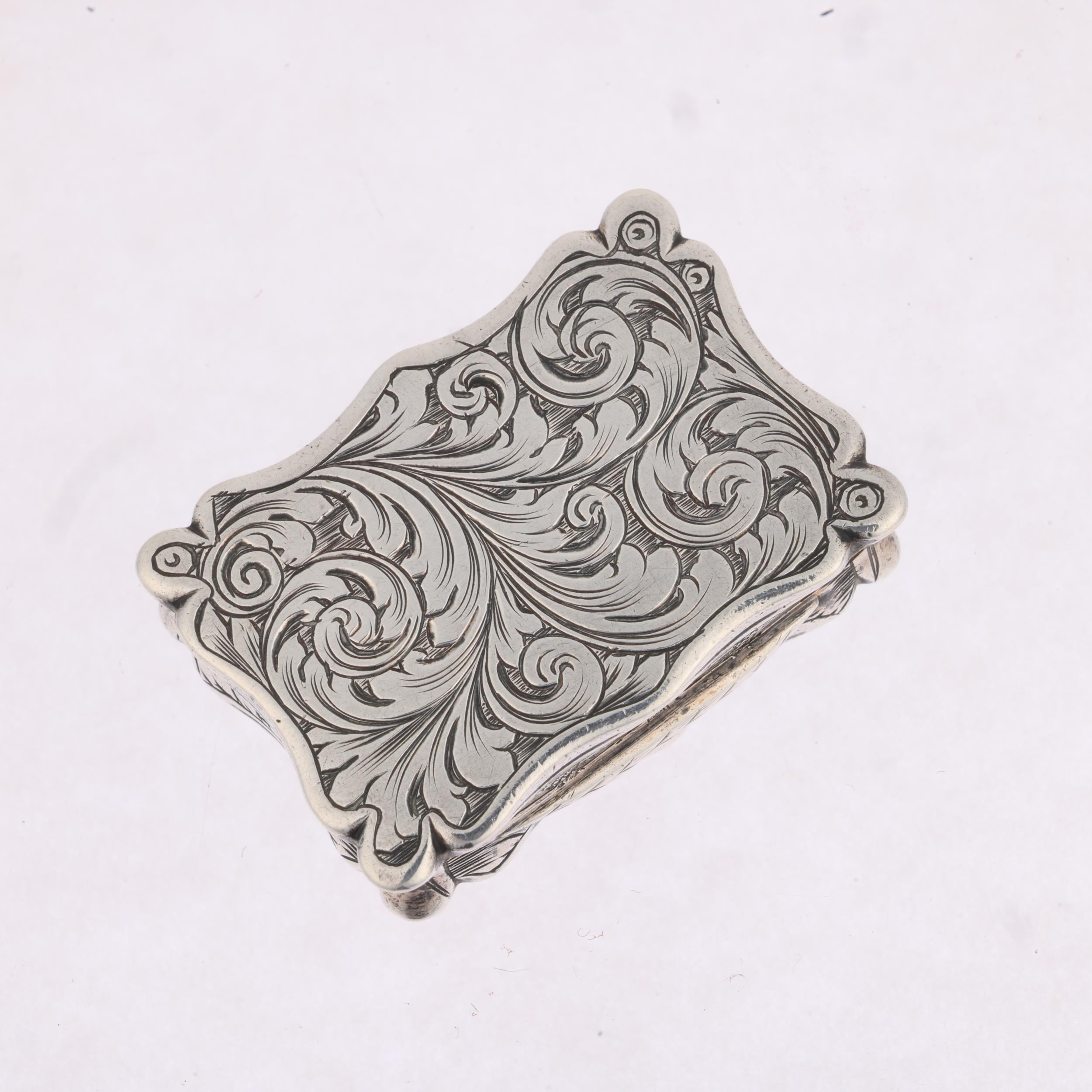 A Victorian silver vinaigrette, Edward Smith, Birmingham 1849, shaped rectangular form, with allover - Image 2 of 3