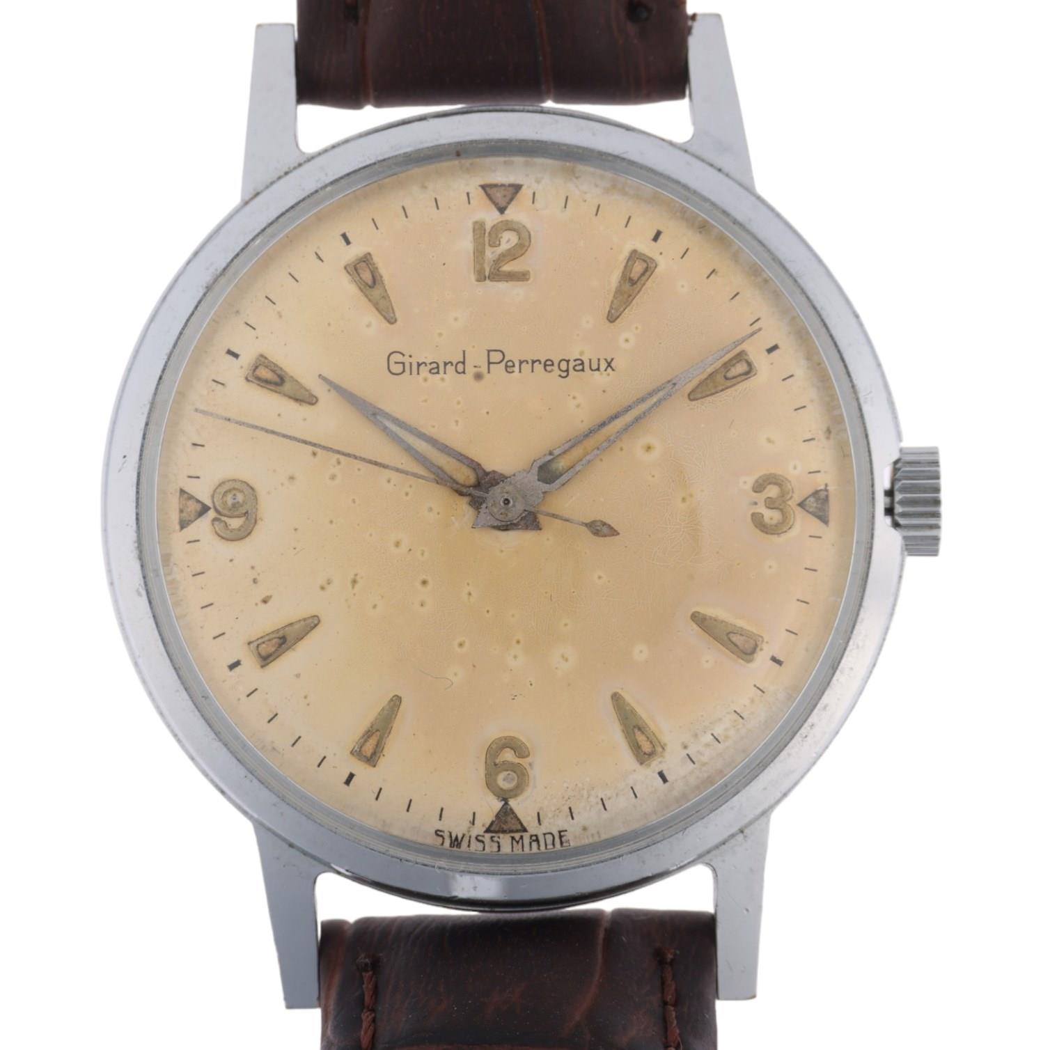 GIRARD-PERREGAUX - a stainless steel mechanical wristwatch, circa 1970s, silvered dial with