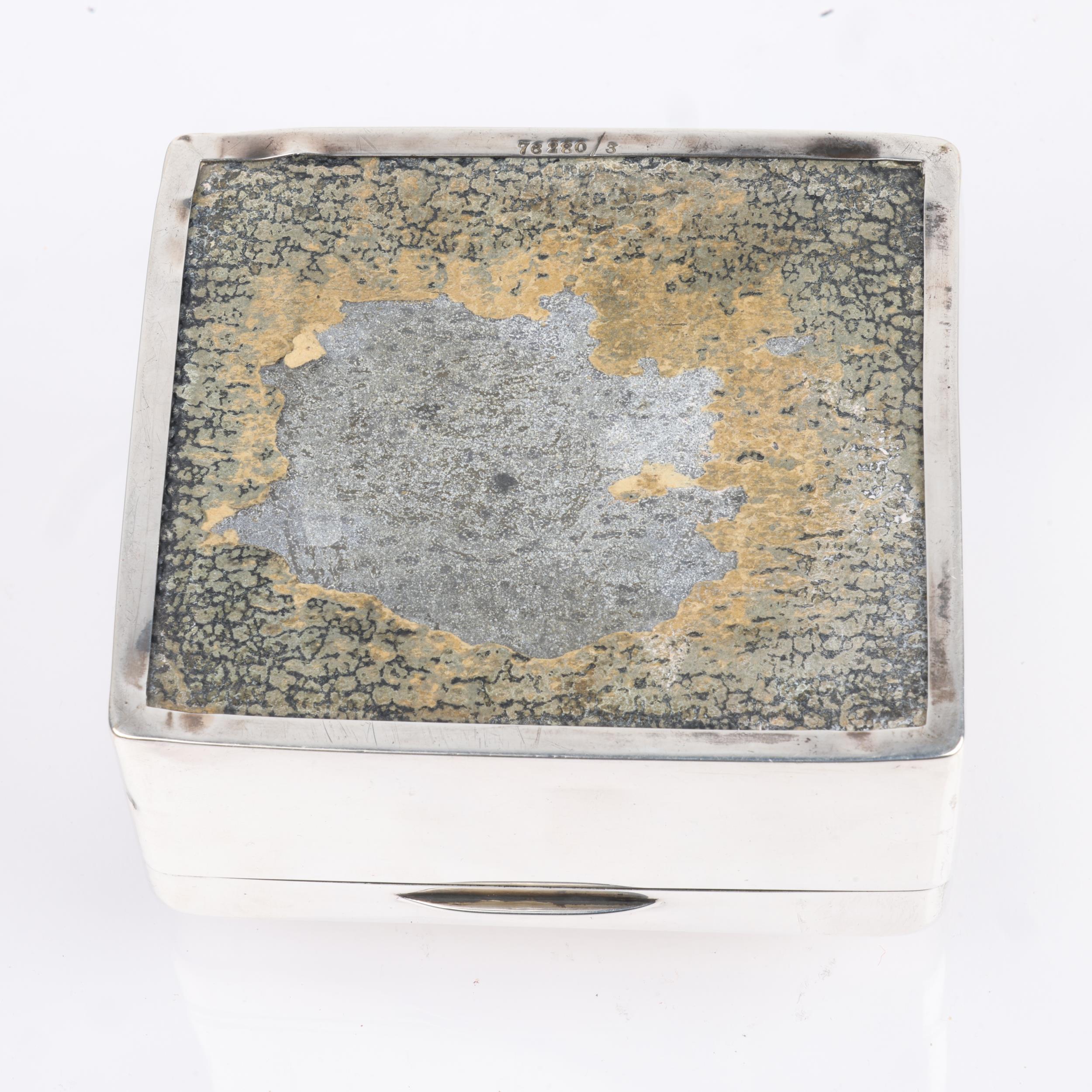 An Art Deco George V silver cigarette box, Elikington & Co, Birmingham 1922, square form with engine - Image 3 of 3